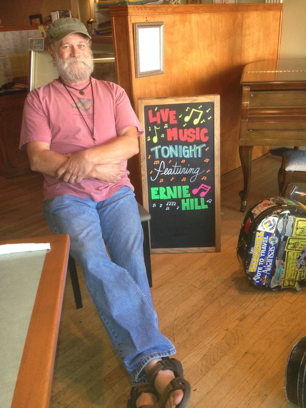 At Biederman's Bistro, Winfield, KS, a gig I've had, one a year, as part of the Walnut Valley Festival Music Crawl, for over ten years. I stroll from table to table when I'm not plinking around on that wonderful piano. Owners Mike and Jane Hawkins and staff provide the best food ever, and have become great friends.