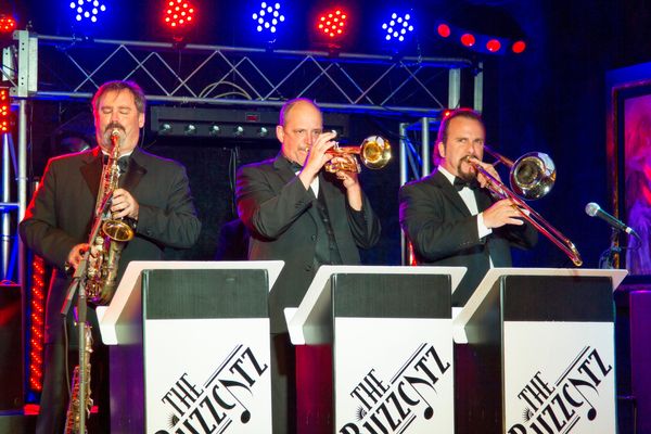 The Buzzcatz horns are a tight unit that have been together since 1998, and include Doug Spoonamore on Sax, Jim Derrick on Trumpet, and Pat Gullotta on Trombone. They make our sound authentic from Sinatra to Motown, Disco, Funk and Jazz. You've also heard them in the parks at Disney, in the house band at BB King's, and even on Don Henley (The Eagles) and Jon Anderson's (Yes) latest albums!