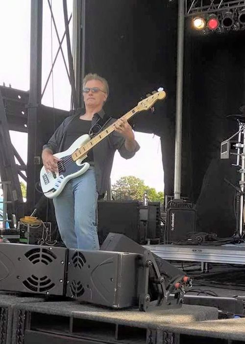 John holding down the bass while opening for the BoDeans.