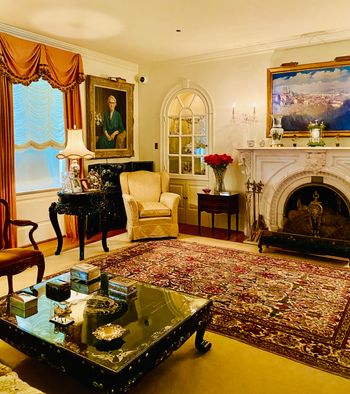 The beautiful and elegant living room with the Lincoln fireplace mantelpiece that the Eisenhowers bought in a federal government surplus property sale after his Presidency.