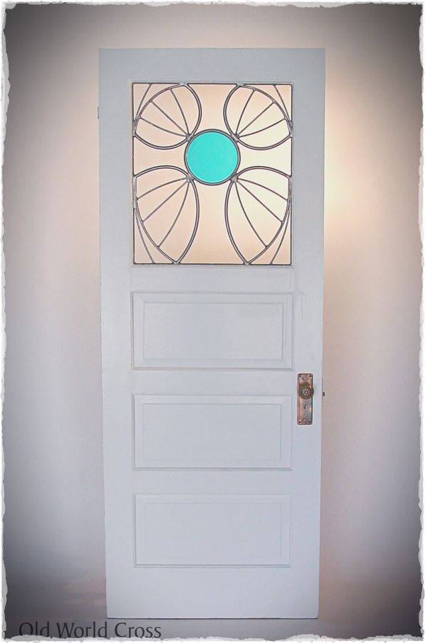 "OLD WORLD CROSS"
2001. Mild steel & fused glass. Custom door insert for a client in California.