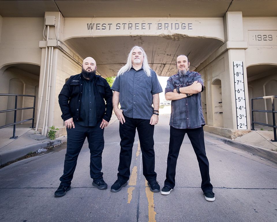 (Left to Right) Pedro Cortes-drums ; John Patitucci-bass ; Jeff Saenz-guitar,vocals / Photo Credit: Concert Fotos