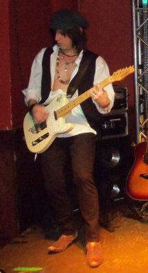 Joey Hanko - Rhythm Guitar/Background Vocals Joey is a multi-instrumentalist veteran of the Long Island, NY and Hollywood, CA music scene. He also attended Five Towns College for Music. Joey's original projects have opened up for Motorhead, Anthrax, Dream Theatre and more. After years of original music he has turned to cover/tribute projects such as “Push” and others. The opportunity to play one of his favorite rhythm guitarists in November Rain is a highlight for him.