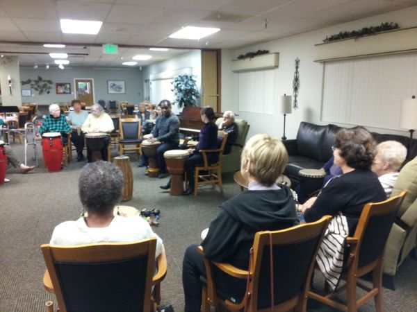 A drumming circle facilitated by Mark