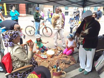 Siama & Dallas hosting an Instrument Petting Zoo for Hennepin Theatre Trust's Open Streets event in 2015 (photo by Tim Campbell)