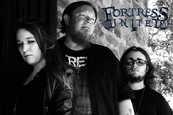 Fortress United:
Stephanie - Bass Guitar •
Shane - Guitar/Vocals •
A.J. - Drums