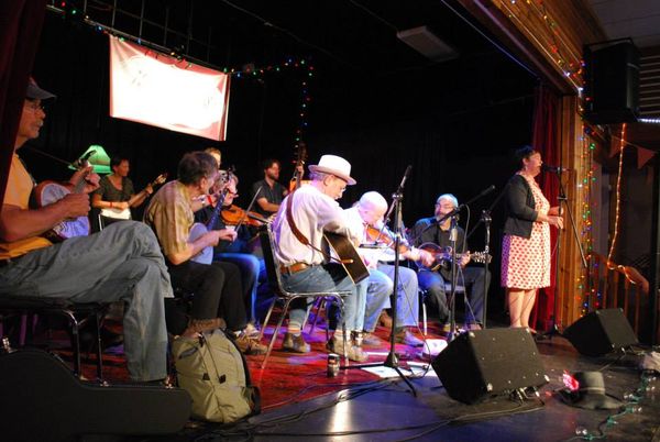 Anne Louise calling at the Nimblefingers Social, with John Reischman and the Canote Brothers leading the band.