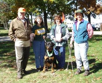 CH Phantom Wood Herbert v. Glenoaks, TD, RN earning his TD with owner Donna Garske at the Medallion Rottweiler Club TD/TDX test. Shown with Tracking Judges Jack Hlustik and Pam German.