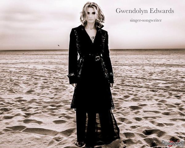 Described as "haunting, soulful, and sometimes a little naughty," Gwendolyn is a published singer/songwriter, pianist and recording artist. Having grown up in a musical family, Gwendolyn started singing and writing early but always had a fear of performing her own music in public. So she began her career in music by writing behind the scenes for various film scores and soundtracks.
In 2009 as the result of a dare to conquer a fear, Gwendolyn began performing her originals anonymously at open mics in Los Angeles. Within 3 months, she was booked at House of Blues on the Sunset Strip. Today she and her band are humbled by a growing fan base of 10,000+ followers, and they perform regularly at The Troubadour, Saint Rocke, House of Blues, Room 5, Viper Room and other Southern CA venues. She has released 2 singles, is signed to 2 music libraries and is working on recording her 1st EP. Gwendolyn was also asked to write the theme song for the United Nations Amazon Reforestation Benefit concert.
For more information about licensing songs or booking Gwendolyn, go to
www.GwendolynEdwardsMusic.com/contact
Awards:
"Best Soundtrack" - 2014 Indie Series Awards
"Best Song in a Movie Soundtrack" - Los Angeles Music Awards, 06,
"Outstanding Score In A Feature Film" - Sundance, Park City Film Music Festival, 06
The band Gwendolyn includes:
Gwendolyn (songwriter, lead vocals, keys)
Dave Rodgers (guitar)
Daniel Bertsch (cello)
(Currently auditioning drummer and back up vocalist)