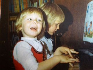 At age three, using the one-finger technique.