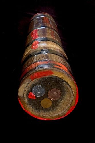 ”Ewart Bamboo Peace Dream Chime,” black bamboo from Burma, coins of Paul Bogle, William Gordon, epoxy pour, acrylic paint, nylon cord, steel disc & rods.