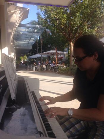 2015 Playing in front of restaurant Louies Modern thanks to the Arts and Cultural Alliance of Sarasota County, Sarasota Keys Piano Project.
