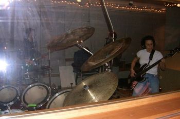 01/31/2005 Rocking out on the bass, live on "Rock the Nation" KGNU Radio Boulder with -YUKON-> Boulder, CO