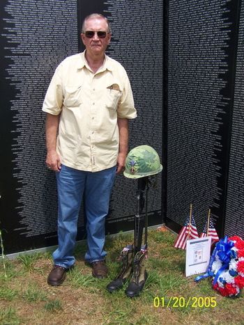 Ernie at the Vietnam Memorial wall 05/14/11. Only by the Grace of God my name does not appear on the wall!