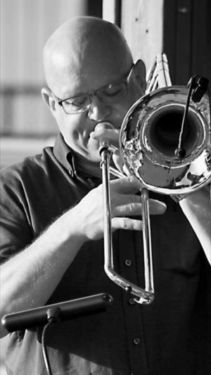 Norm Friede - Trombone - Norm is one of the three original “Greedy Blasters” horn section of Not For Profit. As well as being the trombonist for NFP he can be seen in the horn section of Soul Vaccination, and many of Chicago’s finest big bands. He also is at the helm of his own pro big band, Jazz Faction. Norm has worked with and played beside some of the top studio musicians in Chicago, and because of his high level of musicianship and easy going nature he is always busy with one project or another. Originally from Minnesota, where he studied trombone at the University of Minnesota, he has also been a freelance musician in Baltimore, MD before calling Chicago home in 1994.