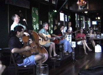 Playing with one of Hawaii's top Jazz bands, Gypsy Pacific. These guys are great players, we had so much fun playing together. Me on ukulele, Marcus Johnson, Phil Benoit, Tom Conway, and Willie Wainright. 8/08