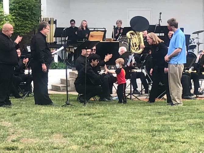 Presentation of the instrument, pictured (foreground, left to right) Norm Wika, conductor of MMBB, Jim Schutz, chair of the MMBB, Elijah Skutt, Jason Walker, Lindsay Walker, President JH Walker Foundation, Justin Walker, Secretary JH Walker Foundation