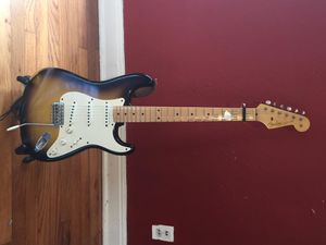This is my 1956 reissue Fender Stratocaster Custom Shop Time Machine Relic (whew!). Unlike the days when we tried to take care of our instruments, this guitar looks like it was dragged behind a bus brand new. I don't get it, but it has that old feel and plays and sounds great. I used it on "The Torch", "Fortune Morning" lead, "She's in the Garden" rhythm, "Try Me", "Love of a Thousand Days" and "Take a Little Time." Also on the treble lead on "Ball and Chain."