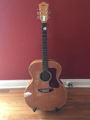 This is my 1980(?) Takamine jumbo flat top accoustic. I bought this from Gary Heard back in the Lone Star Studio days. It is a clone of the Guild jumbo of the same era. It has a very nice big sound and I used it on "The Torch", "Fortune Morning" bridge, and "Take a Little Time."