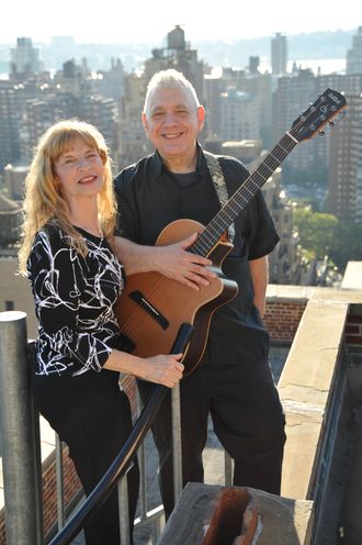 They're on Top of the World with the release of their new mostly folk CD "Windows!"