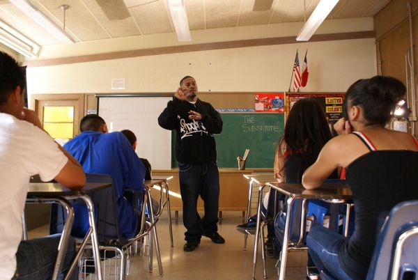 Ahmad inspiring and motivating a group of students who are considered at risk.