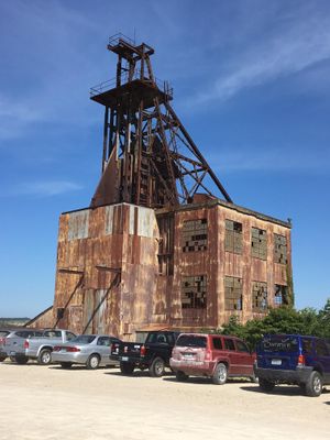 Iconic headframe at the Missouri Mines State Historic Site. The power house has been converted to a museum with minerals and mining equipment.