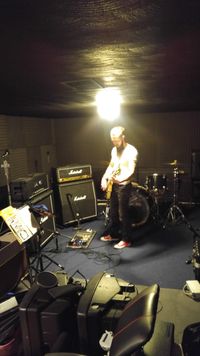 Then we recorded Mike's guitars, which is on the left of the recordings. He was so smooth and easy with his playing, but that fits with his personality--think it through and go with it. It is great to have players that are very comfortable, which is what I try to provide with mobile recording (it was also his house, too). He recorded through the 2 half stacks in the picture--a Dimebag and a Kerry King signature Marshall JCM800, respectively. The sound was even good when I was outside of the house....
Technical: Cascade Fathead ribbon mic and SM57 into Audient mic preamps.
