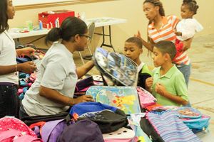 Chasity Taylor Foundation volunteers community event 2017 - Dez Nado and cable TV series cast members from Life & Grind volunteered to help out CTF and over 100 bookbags were collected for underserved area K-12 students.