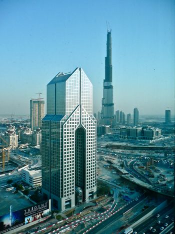 Chris Colby - post sandstorm. Looking at the Burj Khalifa being built - world's tallest building (Is it still the tallest?) - Looking from the Shangri-La Hotel - Dubai, UAE