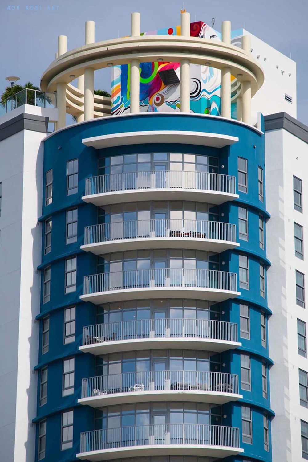 ROB ROBI painted roof top Mural 2022 -- Photo Tom Olsen