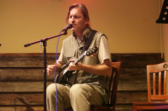 Hosting an open mic at Southern Hops (photo: Kickgrass Productions)