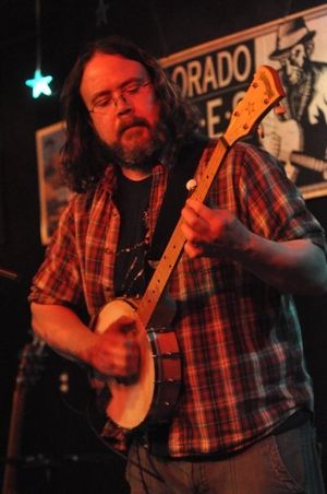 Chris Ramey performing on clawhammer banjo with Crowboy at Oskar Blues, Lyons, CO, 2009.