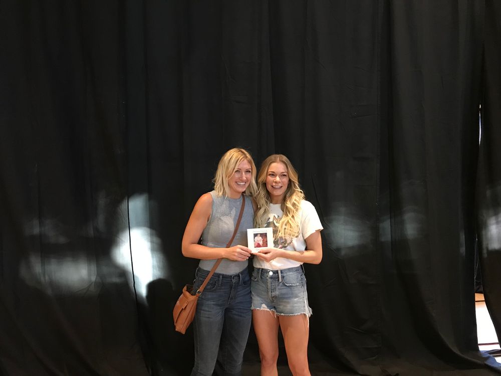 Helena Kletch opening for Leann Rimes, pictured holding Helena's CD - "Grownup"