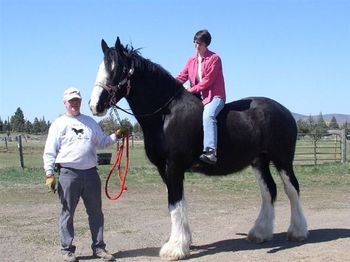 Lindy at "Sisters View Clydesdale Ranch" with Eagle Crest CEO, Jerry Andres, astride his prize Clydesdale, Apollo. April 3, 2004