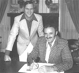 Pictured here are L/R Tom Walls owner of Supreme Records for whom the Dixie Echoes recorded at that time. Tom was a lot like Dale, a real down to earth guy who was great to work with. Tom and his wife Jean ran one of the best record labels in the history of this industry. Don't you just love the outfits Tom and Dale are wearing.