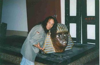 Ronnie was cordial enough to allow me to be present during the writing seesions of "Angry Machines" in 1995. He took a break to post with this prop from Dio's Last In Line Tour.