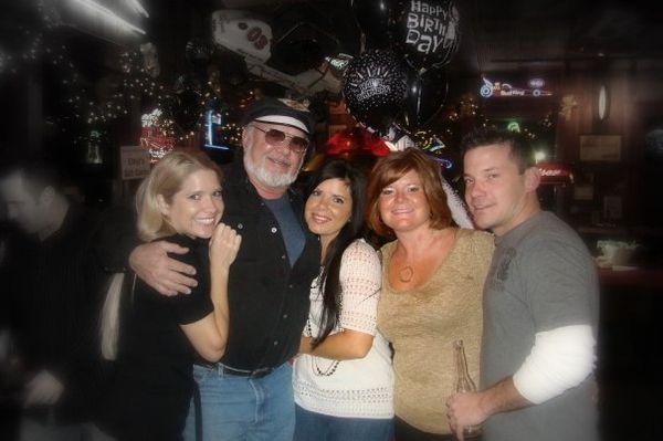 Sheila and Sheena with their dad Charlie, sister Shannon and brother John.