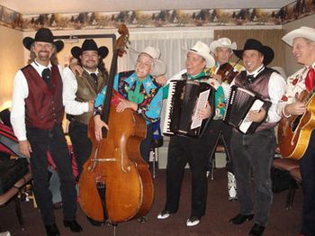 2006 - We went directly from Las Vegas to Rapid City, SD for the Rocky
Mtn. Fair Buyer's convention. How cool is this???? We got to
hang out and visit with the legendary "Riders in the Sky", who
are also represented by our agents at Harmony Artists. These
guys are not only the very best at what they do, offstage they
are some of the nicest, most fun people you'd ever want to meet