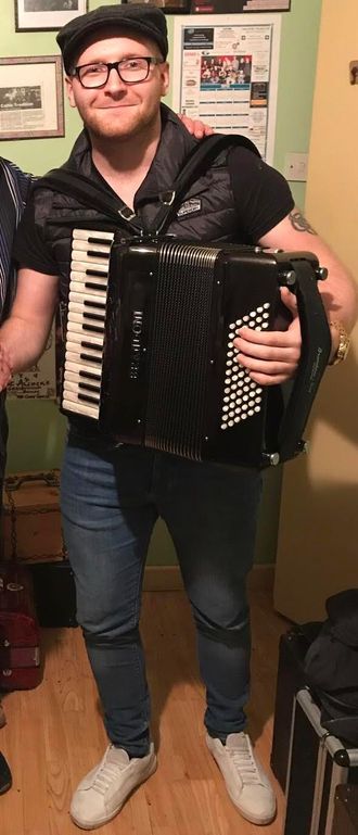Declan picking up his new Brandoni accordion in Killarney, 2017