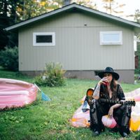 Americana musician Sarah King with inflatable furniture