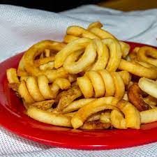 a plate of curly fries