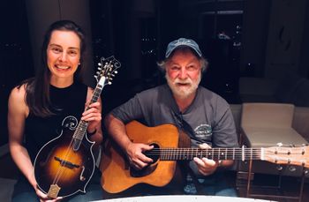 Marina and world-famous luther and guitar player Wayne Henderson with Henderson Mandolin #145 and Wayne's own Henderson dreadnought.