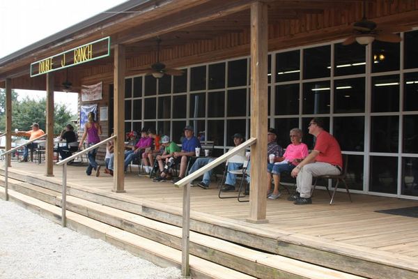The front porch view from our restaurant. You can also see the events from inside the restaurant as well!