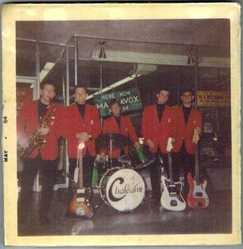 In front of Martin's music - Granada Hills Calif. May, 1964. Tom is the guy with no glasses and also some hair!! (sunburst guitar) Sax player is Bob Fisher who often fills in with The 8 Tracks!