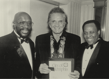 This picture was taken at a private function where Isaac Hayes and David presented a citation to country music legend Johnny Cash.