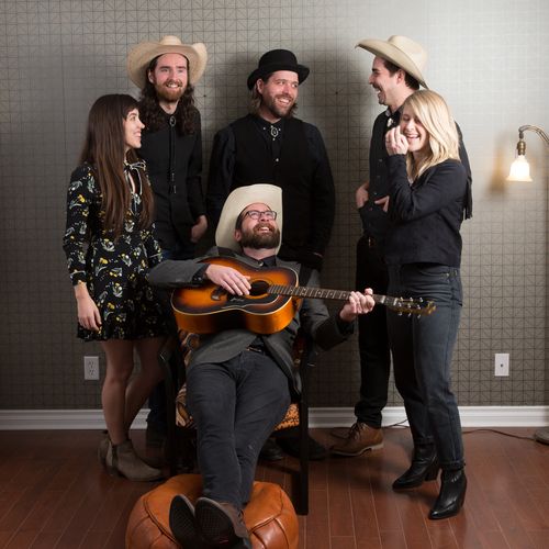band group photo laughing