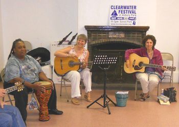 Clearwater Circle of Song with activist Isis (on drum) and host (singer-songwriter and activist) Ingrid Heldt in Asbury Park in June 2011