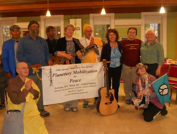 PEACE AND PLANET
On Earth Day, April 22, 2015, members of the Coalition Against Endless War (based in Highland Park, N)J hosted Peace Walkers from the Peace Pagoda in Massachusetts on their way to New York City to participate in the Peace and Planet march and rally at the United Nations to call for the abolition of all nuclear weapons. The Coalition invited Sharleen to perform topical music for the peacemakers on their stopover. She was joined by songs4peace members Ingrid Heldt and Linda Phillips.