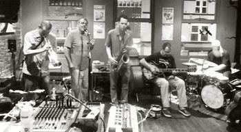 Performing on tenor sax footage displayed by Frakture: Centrifuge #22 in Manchester @ Fuel Bar Cafe...July 2013 - Image supplied by: https://scontent-man2-1.xx.fbcdn.net/v/t1.18169-9/1146576_10151643733004005_1482748563_n.jpg?nc_cat=103&ccb=1-5&nc_sid=cdbe9c&nc_ohc=ESt_Do81IRkAX-FDPdp&nc_oc=AQkkQhvpAmsXh9MHvYbdQ5TmyhNWFPkHaH2J8zKpaQWvpkpi_x1wP9NSG3ALR-CDxXmFVRyJK07VKOkr3SjCYH37&tn=-VFCodakcwma8udf&_nc_ht=scontent-man2-1.xx&oh=db00fbcbbac7ef1d3884e7386e10e162&oe=61D91DE9