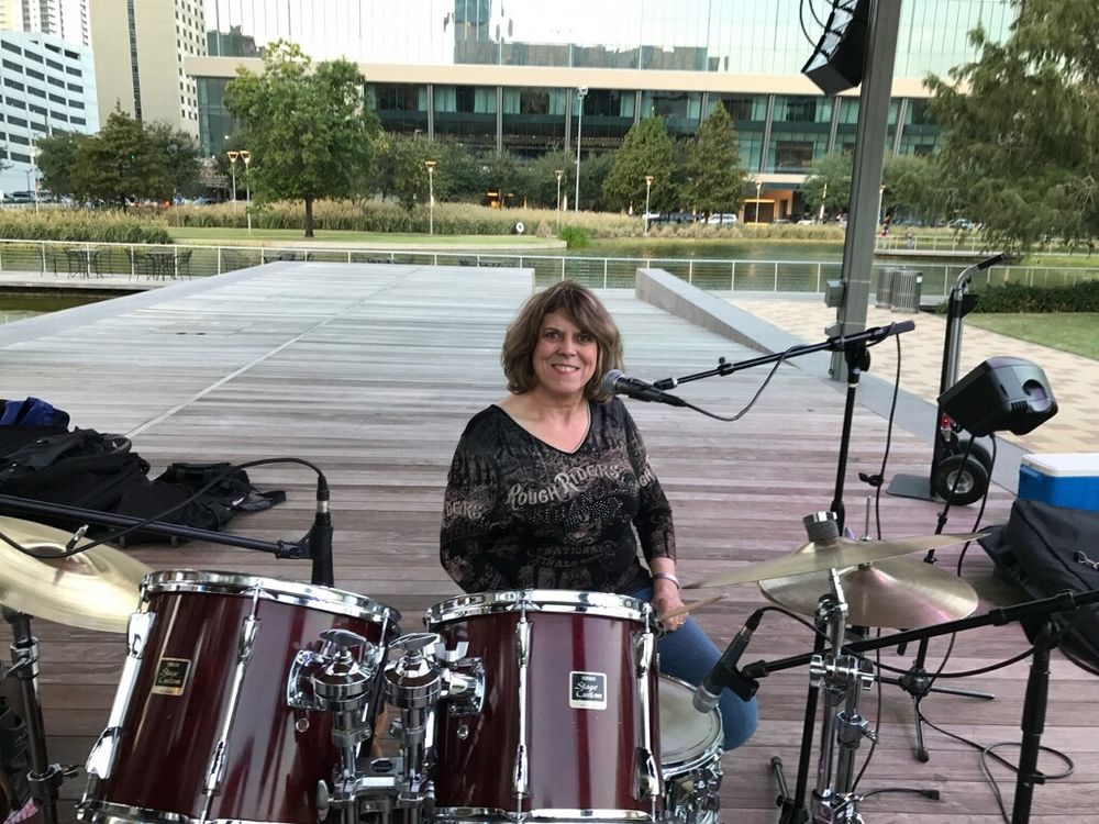 Liz Talley has been playing gigs around the Houston area for over 25 years. She started playing music professionally while in junior high school and played drums with several country groups in the Urban Cowboy Days. She soon became one of the most sought after drummers because she played drums and sang! Liz then developed her own band and started playing corporate events for most of the booking agents in town. With the corporate parties and tourism coming through Houston, she and a couple of band members started the acoustic group--Three of a Kind as a welcome to Texas show. That group is one of the most popular acoustic acts in the Houston area! Liz has also recorded two successful honkytonk cd's, had her music played on several country music stations in the states (including Willies place on Sirius radio) and the European market and performed several times in Europe. She has played drums for several entertainers such as Rockabilly queen Wanda Jackson and Tommy Cash and opened shows for George Jones, Mel Tillis, Gene Watson, Bobby Bare, Eddie Raven and many more. Always an entertainer and professional at all times!